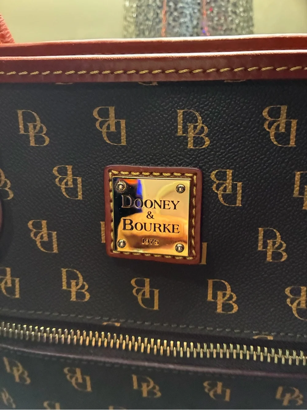Dooney & Bourke Greta Dark Brown Logo Tote with Red Trim